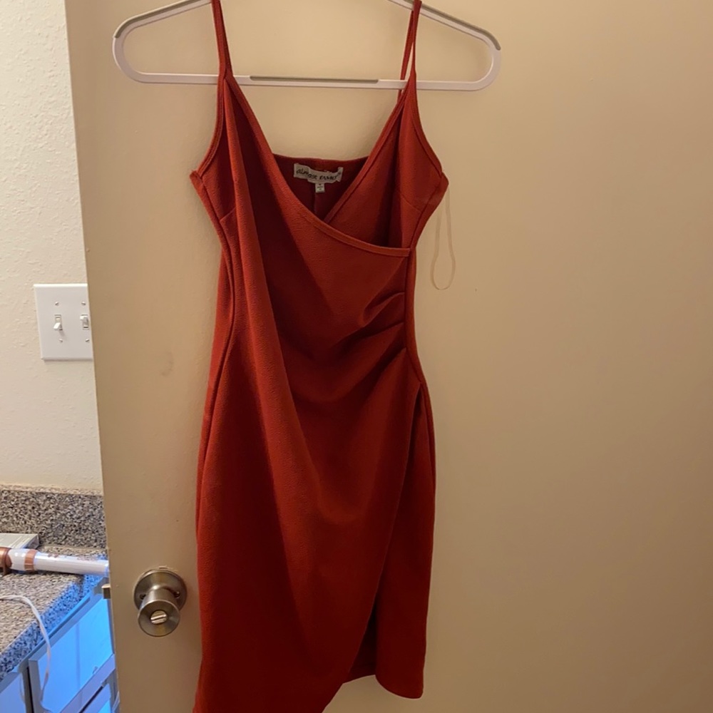Almost Famous burnt orange asymmetrical dress